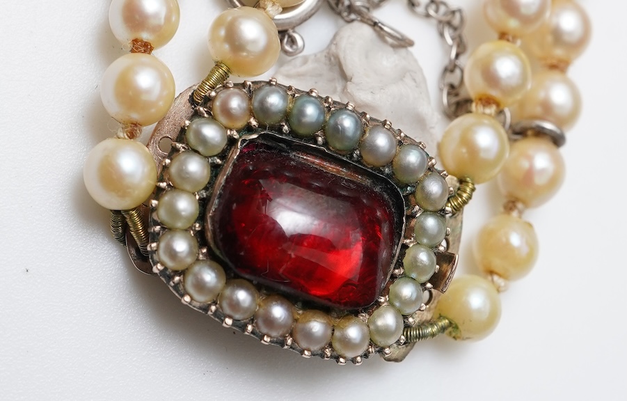A cultured pearl and garnet necklace, 19th century and later